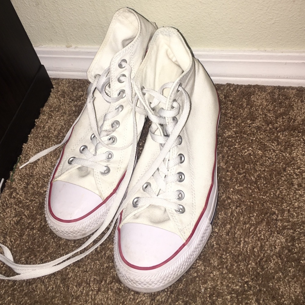 White high top converse with red line